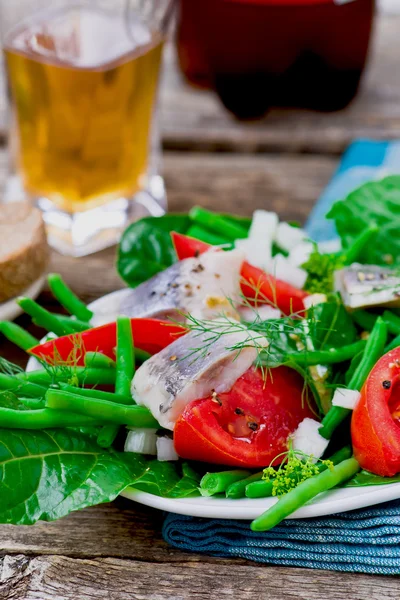 Herring ,green beans, and tomatoes summer salad. — Stock Photo, Image