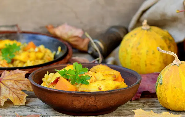 Rice - a curry with fish and pumpkin — Stock Photo, Image