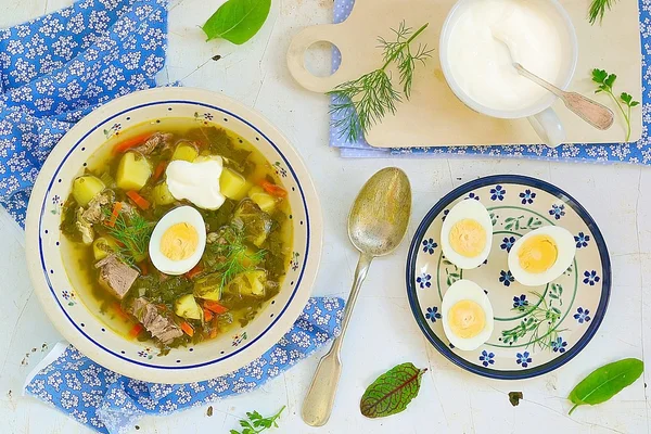 Sorrel  egg and sour cream soup . — Stock Photo, Image