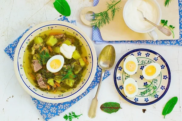 Sorrel  egg and sour cream soup . — Stock Photo, Image