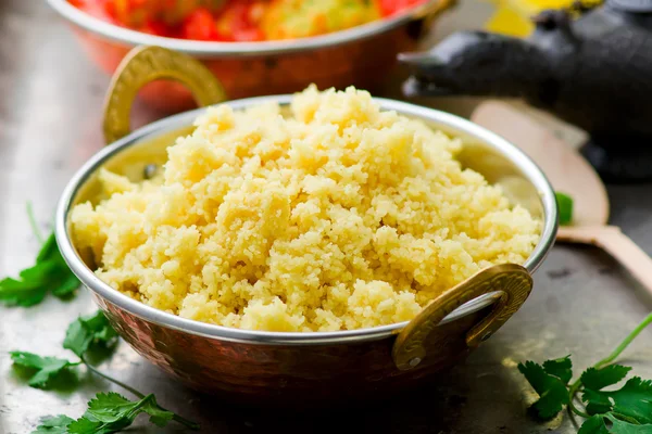 Couscous.in copper east drinking bowl — Stock Photo, Image