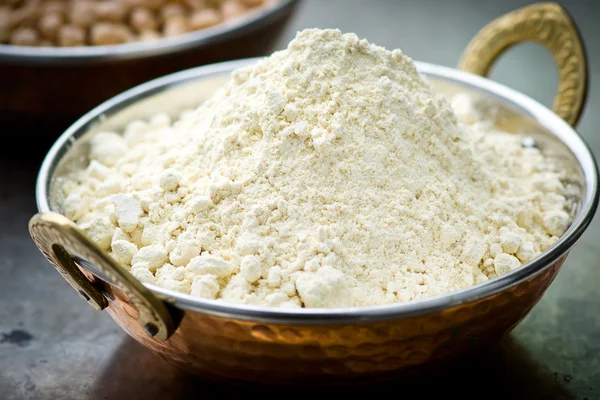 Flour from chick-pea in the Indian copper bowl — Stock Photo, Image