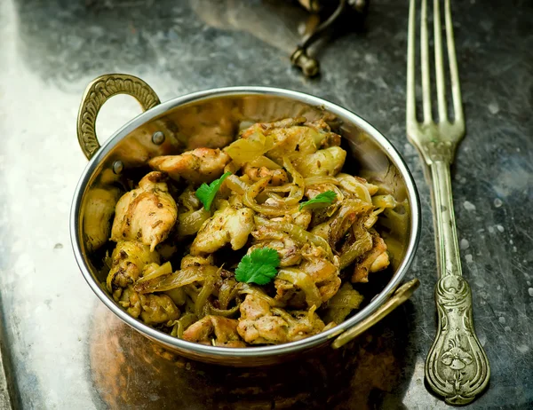 fried chicken fillet in the Indian copper bowl