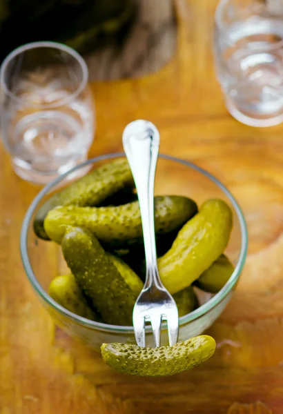 Pickled cucumbers   on a fork — Stock Photo, Image