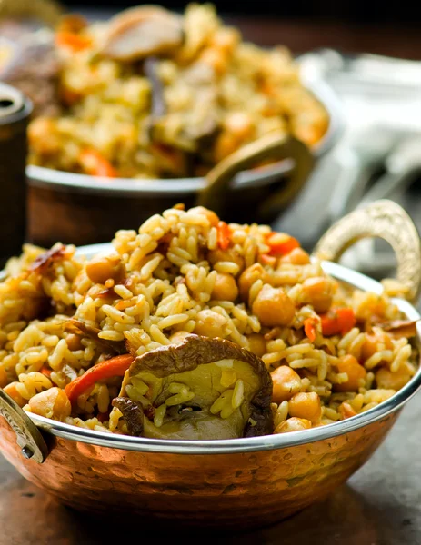 Vegetarian pilaf with chick-pea and mushrooms — Stock Photo, Image