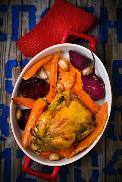 The chicken baked with root crops. — Stock Photo, Image