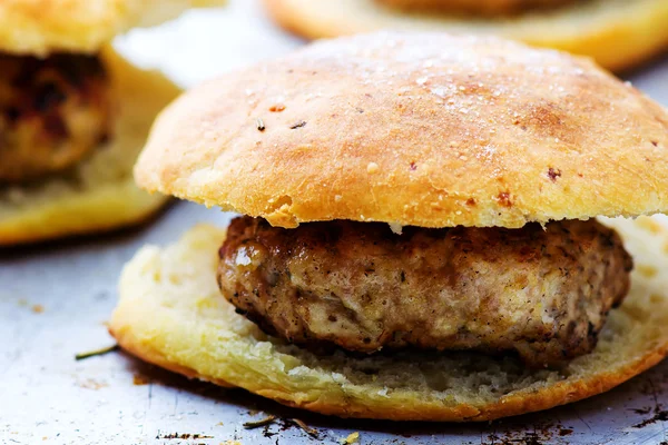 Chicken burger on a baking sheet — Stock Photo, Image