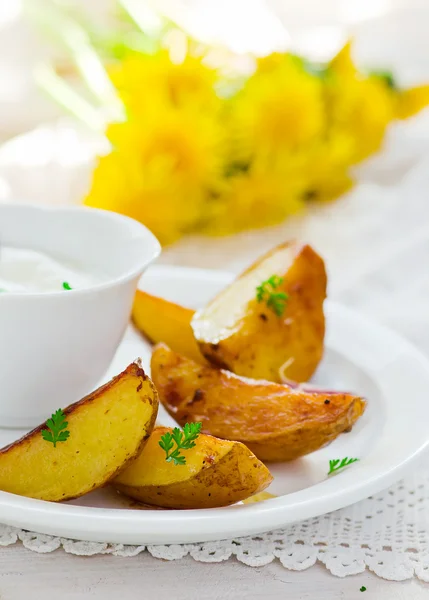 Segments of baked potato — Stock Photo, Image