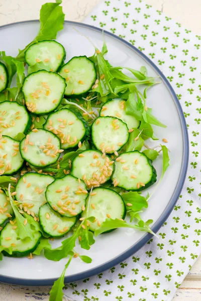 Salad from cucumbers with a linen seed — Stock Photo, Image