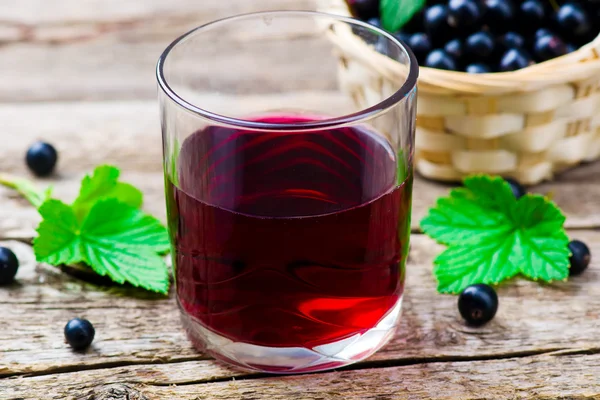 Cold drink from black currant — Stock Photo, Image