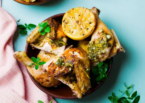 Chicken a grill with a lemon — Stock Photo, Image