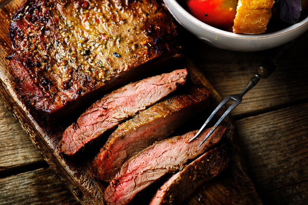 flank steak  with tomato salad. 