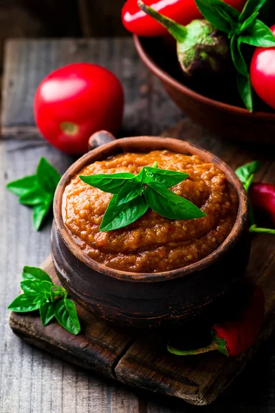 Eggplant paste in a ceramic pot — Stock Photo, Image