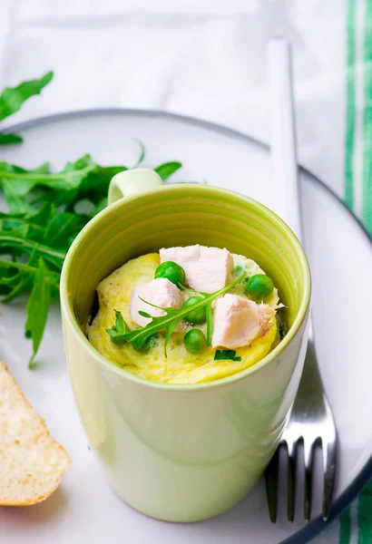 Omelet in a  mug prepared in microwave — Stock Photo, Image