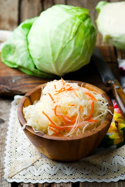 Sauerkraut in a wooden bowl — Stock Photo, Image