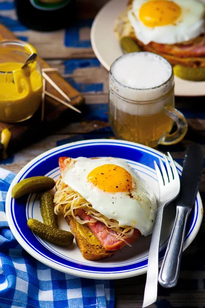 Sandwich with sauerkraut , ham and fried eggs — Stock Photo, Image
