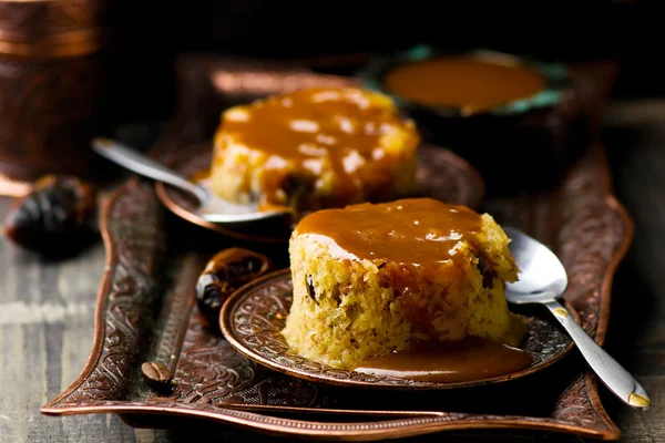 Date pudding with caramel — Stock Photo, Image