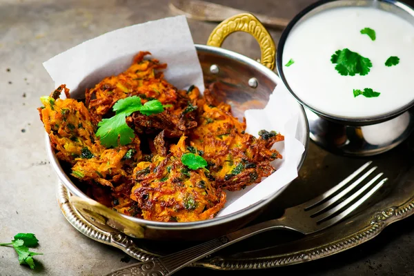 Carrot fritters with yogurt — Stock Photo, Image