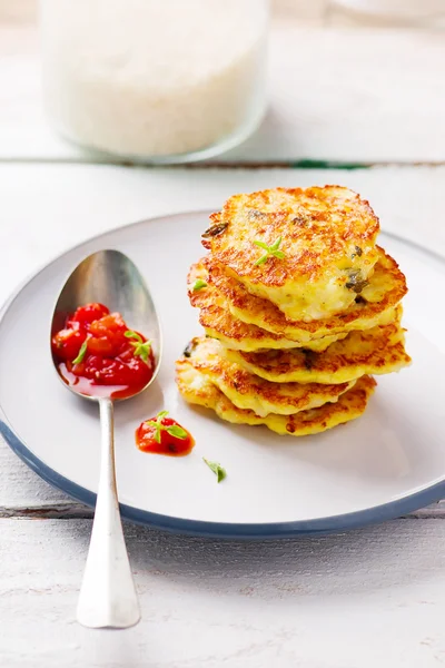 Rice fritters  with tomato sauce — Stock Photo, Image