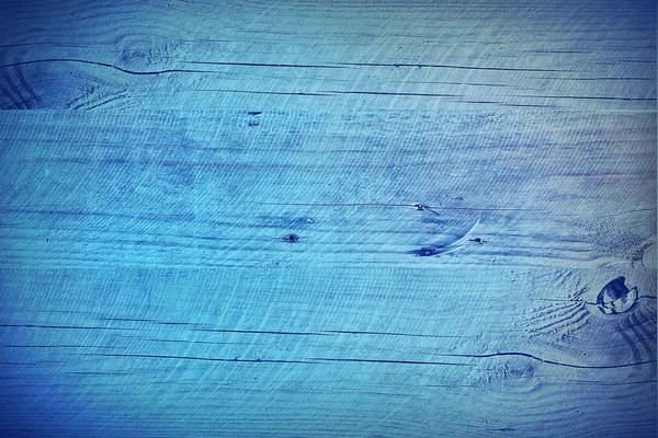 Niebieskim tle drewniane — Zdjęcie stockowe