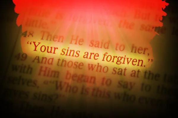 Bible text - YOUR SINS ARE FORGIVEN — Stock Photo, Image