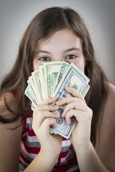 Mooie tiener meisje bedrijf geld — Stockfoto