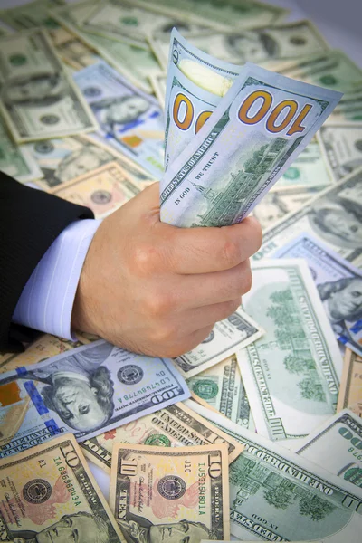 Αμερικανικά δολάρια στο χέρι — Φωτογραφία Αρχείου