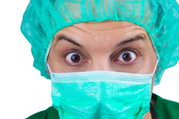 Portrét lékař chirurg překvapen, hrají s velkýma očima — Stock fotografie