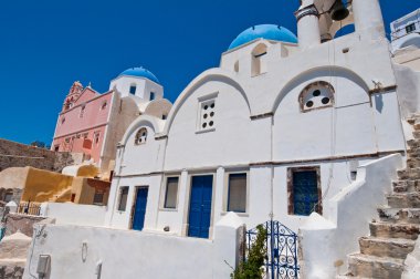 Blue domed church on the island of Santorini also known as Thera, Greece.