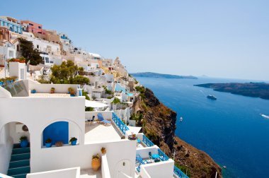 Panorama of Fira town on the edge of the caldera cliff on the island of Thira (Santorini), Greece.