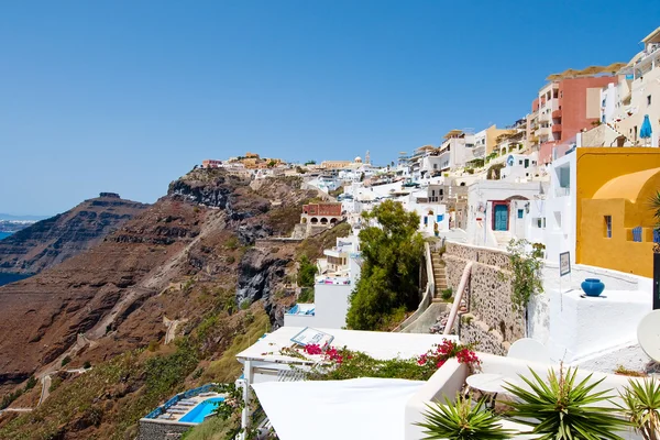 SANTORINI,FIRA-JULY 28: Fira landscape on the top of the caldera on July 28,2014 in Fira town on Santorini, Greece. Fira is the modern capital of the Greek Aegean island, Santorini. — Stock Photo, Image