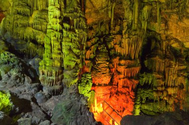 Impressive stalactites in the Psychro Cave also known as Cave of Zeus. Crete island,Greece. clipart
