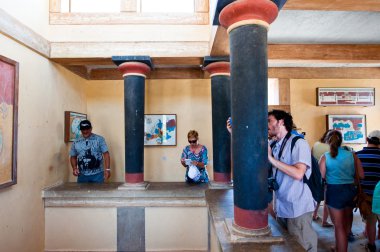CRETE,GREECE-JULY 21: Tourists at the Knossos palace on July 21,2014 on the Crete island in Greece. clipart
