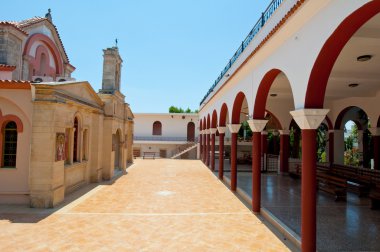 CRETE,HERAKLION-JULY 25:Monastery of Panagia Kalyviani arched courtyard on July 25,2014 on the Crete island, Greece. The Monastery of Panagia Kalyviani is located 60km south of Heraklion.