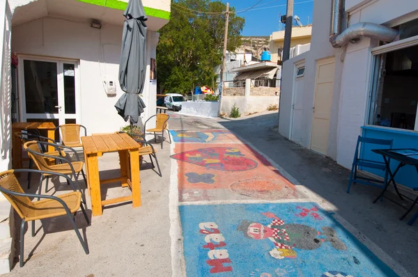 MATALA,CRETE-JULY 22: Matala village on July 22,2014 on the island of Crete, Greece. Matala is a village located 75 km south-west of Heraklion, Crete. — Stock Photo, Image