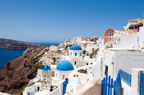 The edge of the caldera with white houses on the island of Santorini, Greece.