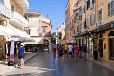 CORFU-AUGUST 24: Tourists go shopping on Corfu island on August 24,2014 in Kerkyra town, Greece.