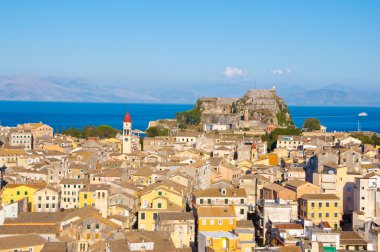 CORFU-AUGUST 22: Panoramic view of Corfu old town with the Old Fortress and the Saint Spyridon Church in the distance from the New Fortress on August 22, 2014 on Corfu island, Greece.