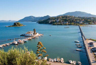 Pontikonisi and Vlacheraina monastery seen from the hilltop of Kanoni on the island of Corfu, Greece.