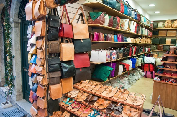 CORFU-AUGUST 24: Souvenirs displayed for sale in a local shop on August 24,2014 on Corfu island, Greece. — Stock Photo, Image