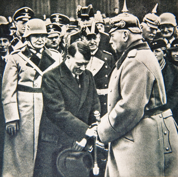 BERLIN MARCH 21: Adolf Hitler greets President Paul von Hindenburg  on March 21, 1933 in Potsdam, Germany.