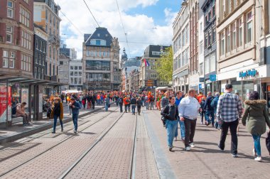 AMSTERDAM-APRIL 27: Crowd of people celebrate the King's Day on Rokin street on April 27,2015.