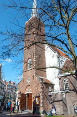Amsterdam, Netherlands-April 30: The English Reformed Church at Begijnhof, people go sightseeing on April 30,2015.