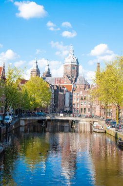 Amsterdam-April 30: Red light district, the Church of St. Nicholas is visible in the distance on April 30,2015.