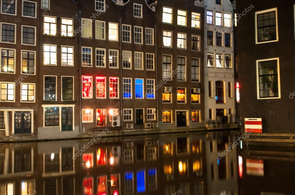 Download - Red light district at night in Amsterdam. 