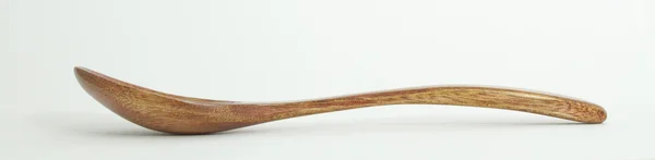 Colher de metal e madeira em perfil — Fotografia de Stock