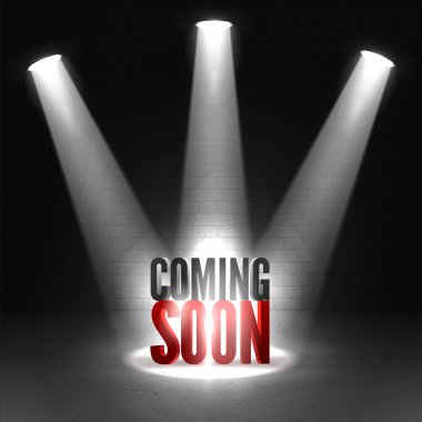 Coming soon. Text in Spotlight shine effects on a dark background