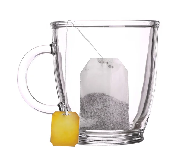 Prázdnou sklenici šálek čaje s sáček čaje izolovaných na bílém pozadí — Stock fotografie