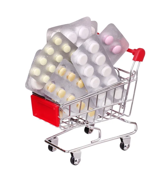 Pills in shopping cart isolated on white background — Stock Photo, Image