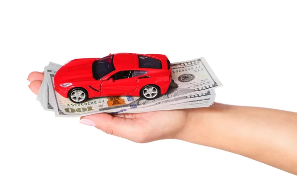 Car with cash in female hand isolated on white background — Stock Photo, Image